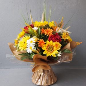 Pompes Funèbres Grosso : Bouquet bulle tournesol jaune 45cm(hauteur)x41cm(largeur)